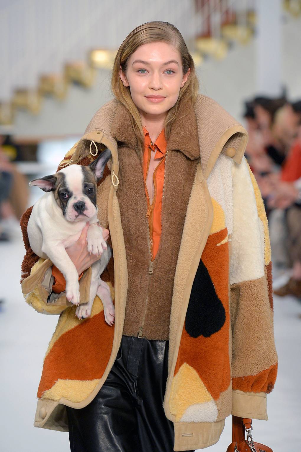 Milan Fashion Week: Gigi Hadid Carries Puppy Down The Runway | Glamour UK