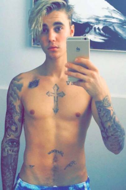 follow on instagram justinbieber just showing off his tatts in the bathroom mirror - tattooed guys to follow on instagram