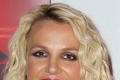 Britney Spears’ blonde curls - celebrity hair and hairstyles | Glamour UK