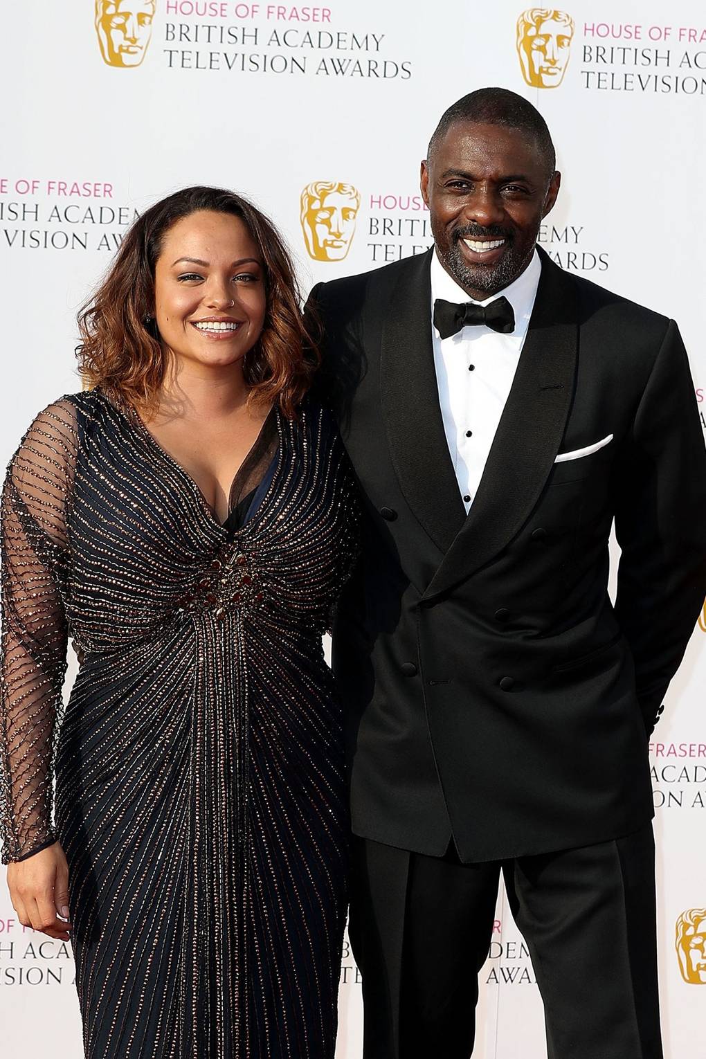 Idris Elba back with girlfriend Naiyana Garth | Glamour UK