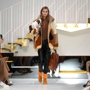 Milan Fashion Week: Gigi Hadid Carries Puppy Down The Runway | Glamour UK