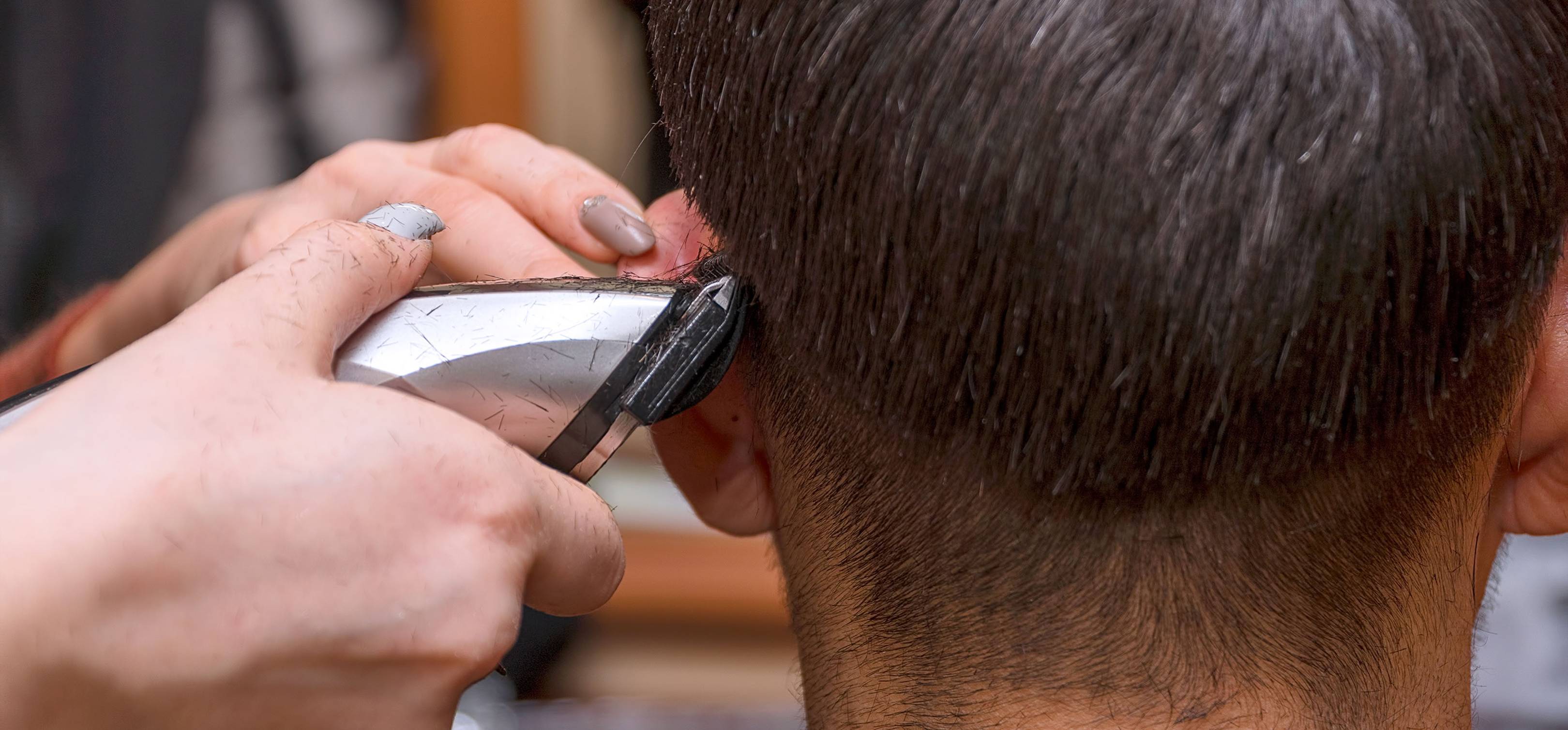 using hair clippers to cut hair